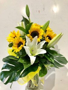 Sunflowers and Lilies in a Vase